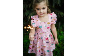 Birthday girl in pink cakes ruffle dress