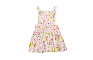 Baby and toddler pinafore dress in pink plants print, back view