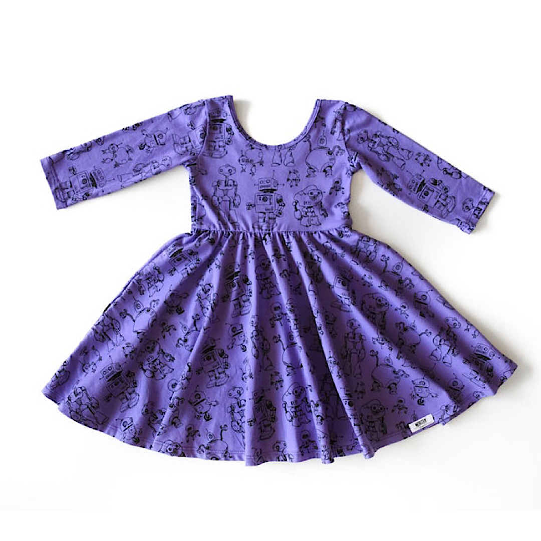 Girls purple twirly dress with robots print, STEM clothing for girls