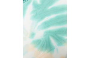 Close up view of kids tie dye loungewear in seaglass 