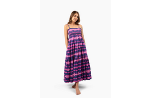 Model wearing fuchsia and navy tie dye dress